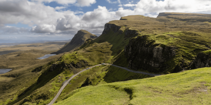 a view of a rocky mountain with Quiraing in the background