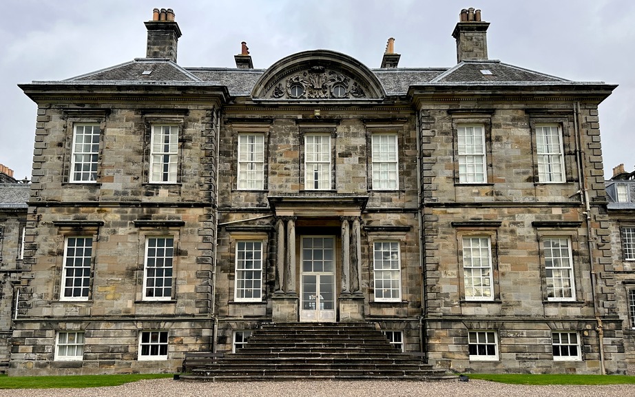 a large stone building with many windows